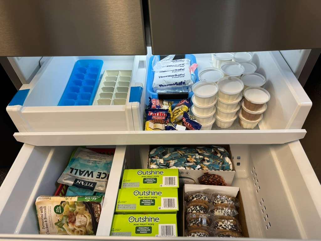Fully stocked shelves in the refreshed teacher lounge
